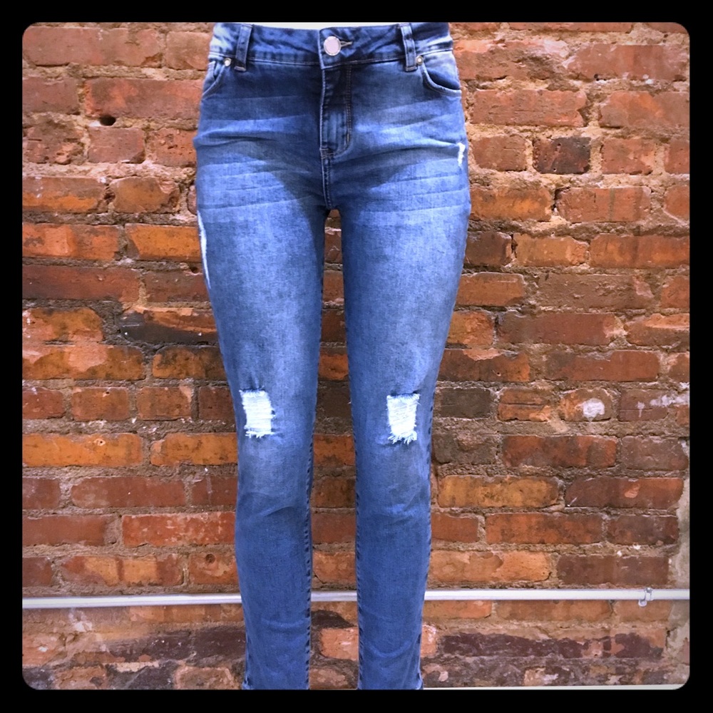 Distressed ankle length jeans